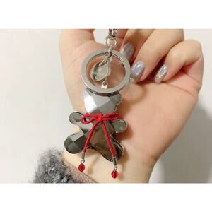 Swarovski Crystal Hug Me Teddy Bear Bag Charm with Red Bowtie